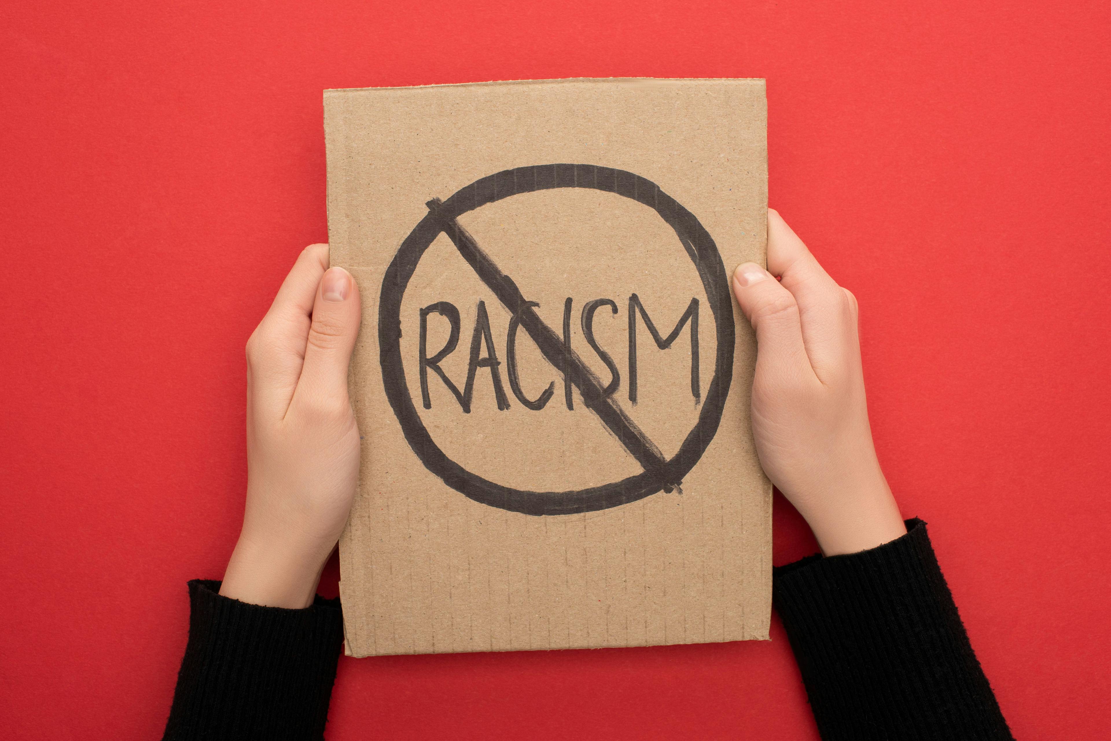 end racism, no racism sign 
